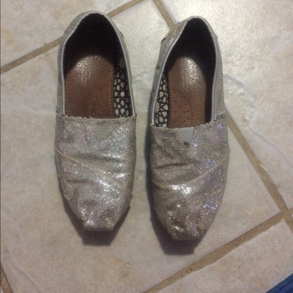 Silver, sparkly Toms.
