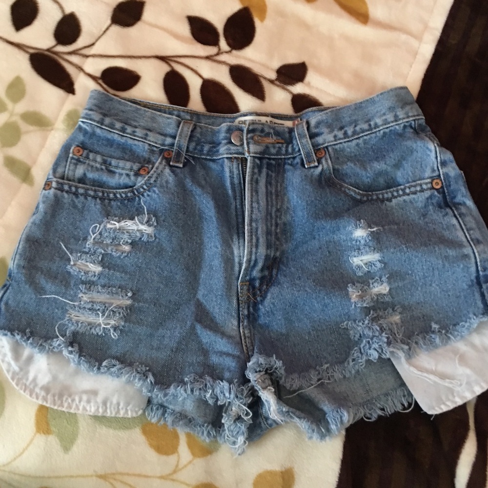 UO High waisted distressed shorts