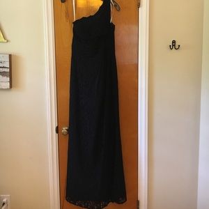 Long black and lace bridesmaid dress. David Bridal