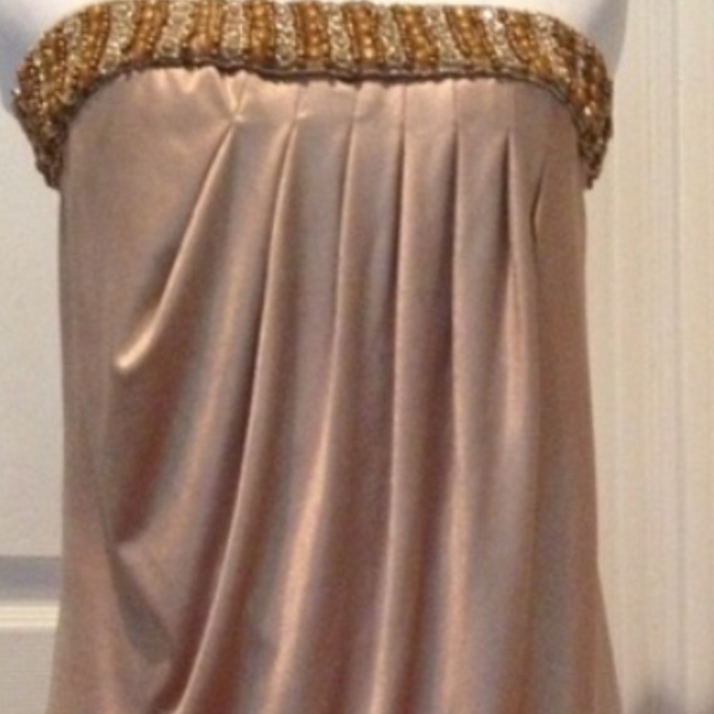 Beautiful gold beaded Cache top. Size M