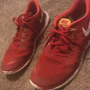 red and yellow nike free run 5.0