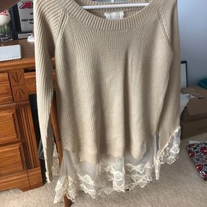 Sweater with lace at bottom and end of sleeves