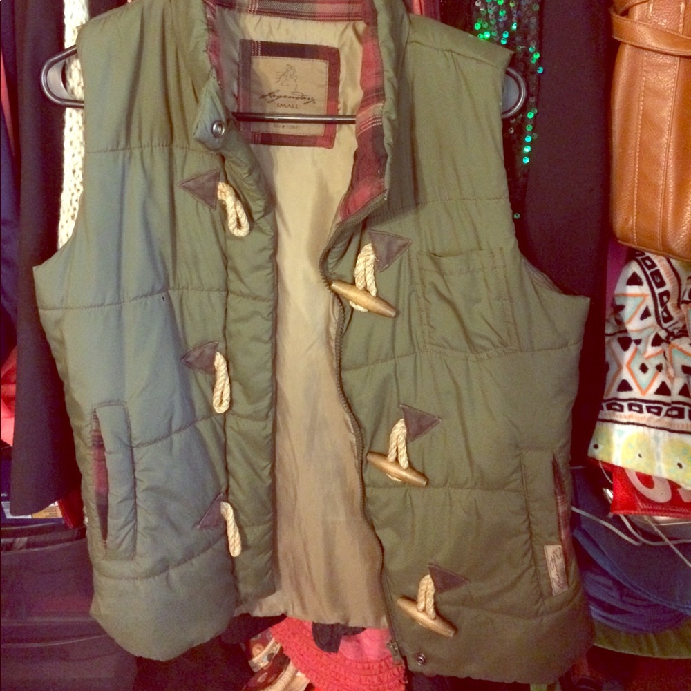 Dark green, warm, hunting vest. Worn twice!