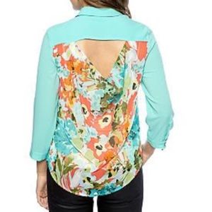 A. Byer open back floral blouse