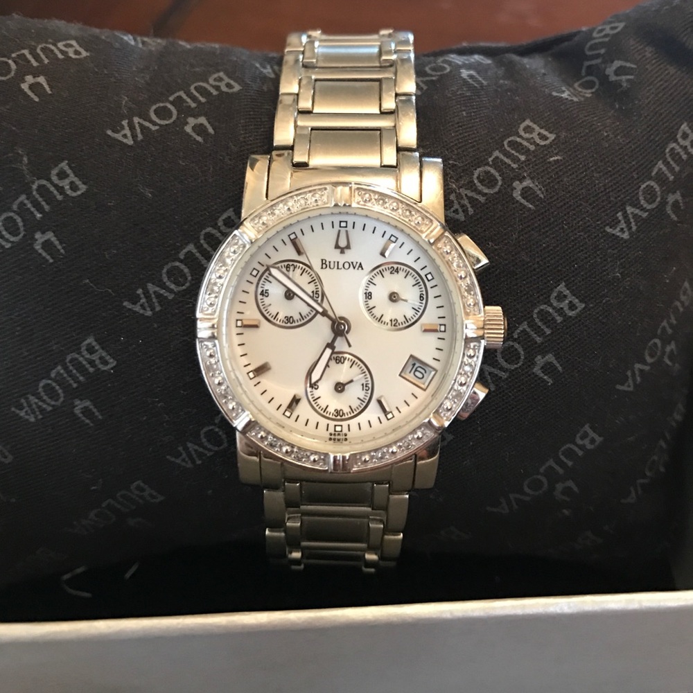 Stainless steel. Silver. Bulova diamond watch.