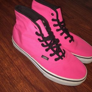 Neon pink high top vans