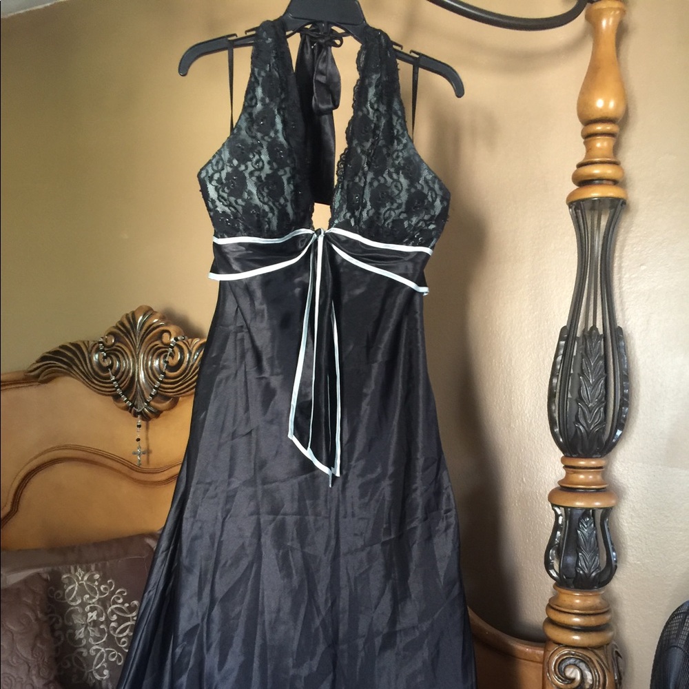 Black satin formal dress with mint color bodice.