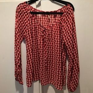Black white and red blouse