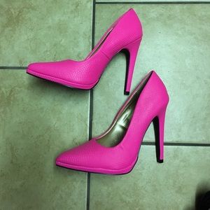 Neon pink heels