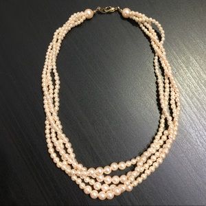 Multi strand faux pearl necklace