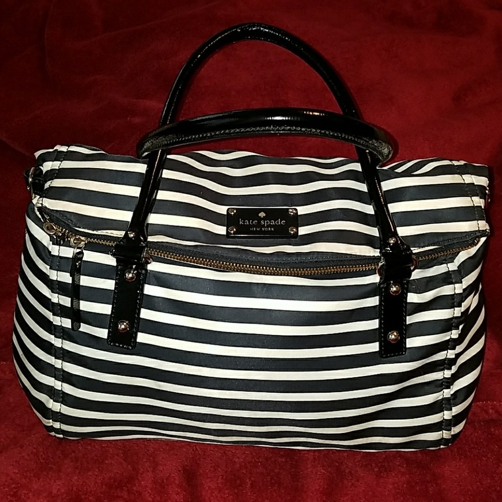Authentic Kate Spade fold over bag.