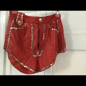 Red leather look studded shorts