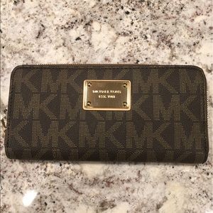 Brand new with tags Michael Kors logo wallet!