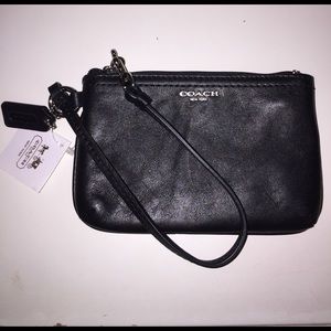 Black Coach wristlet. Never used.