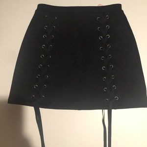 Lace up black mini skirt