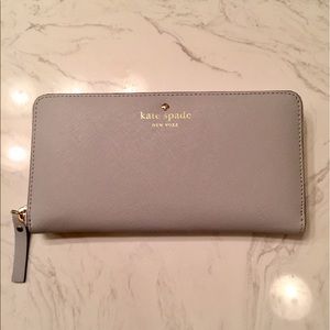 Bags - Brand new light gray Kate Spade Wallet. Bags - Brand new light gray Kate Spade Wallet.