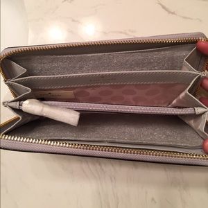Bags - Brand new light gray Kate Spade Wallet. Bags - Brand new light gray Kate Spade Wallet.