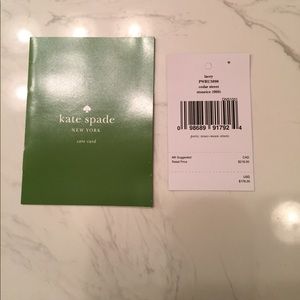 Bags - Brand new light gray Kate Spade Wallet. Bags - Brand new light gray Kate Spade Wallet.