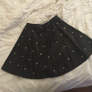 Faux leather a line skirt with gold accents