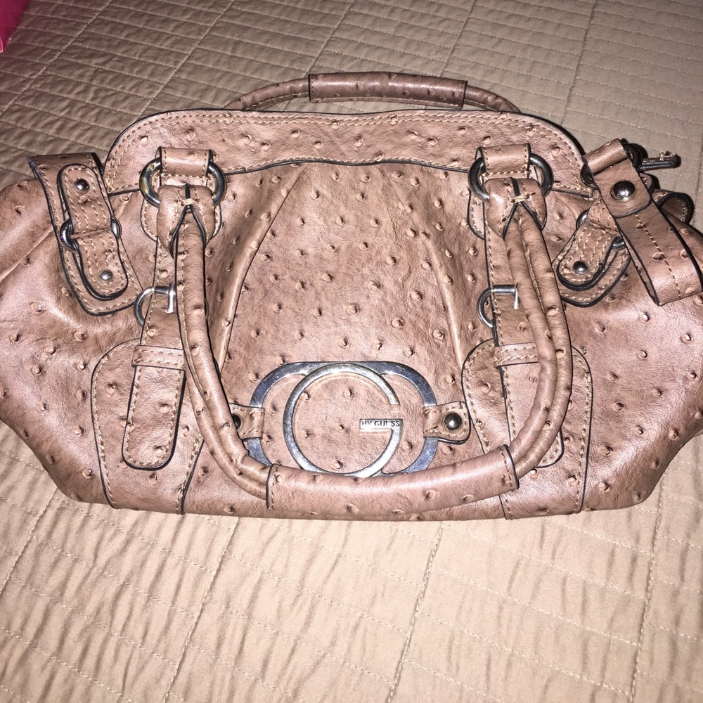 Guess wallet and purse.