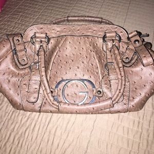 Guess wallet and purse.