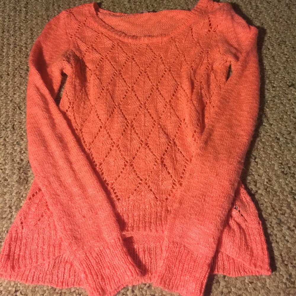 Bright orange sweater