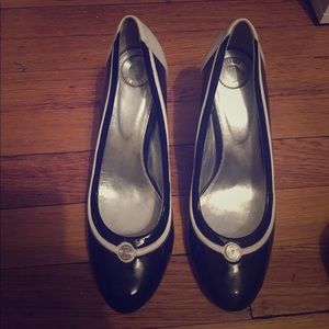 Versus by Versace round toe black patent pumps