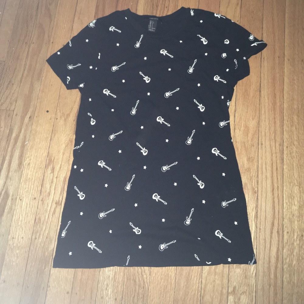 Black tee with guitar and stars on it