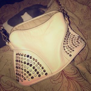 Cute White studded over the shoulder purse.