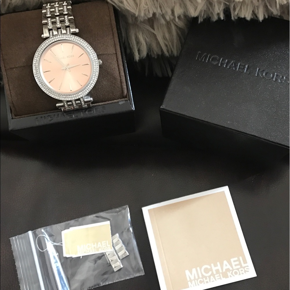 Michael kors silver and pink face