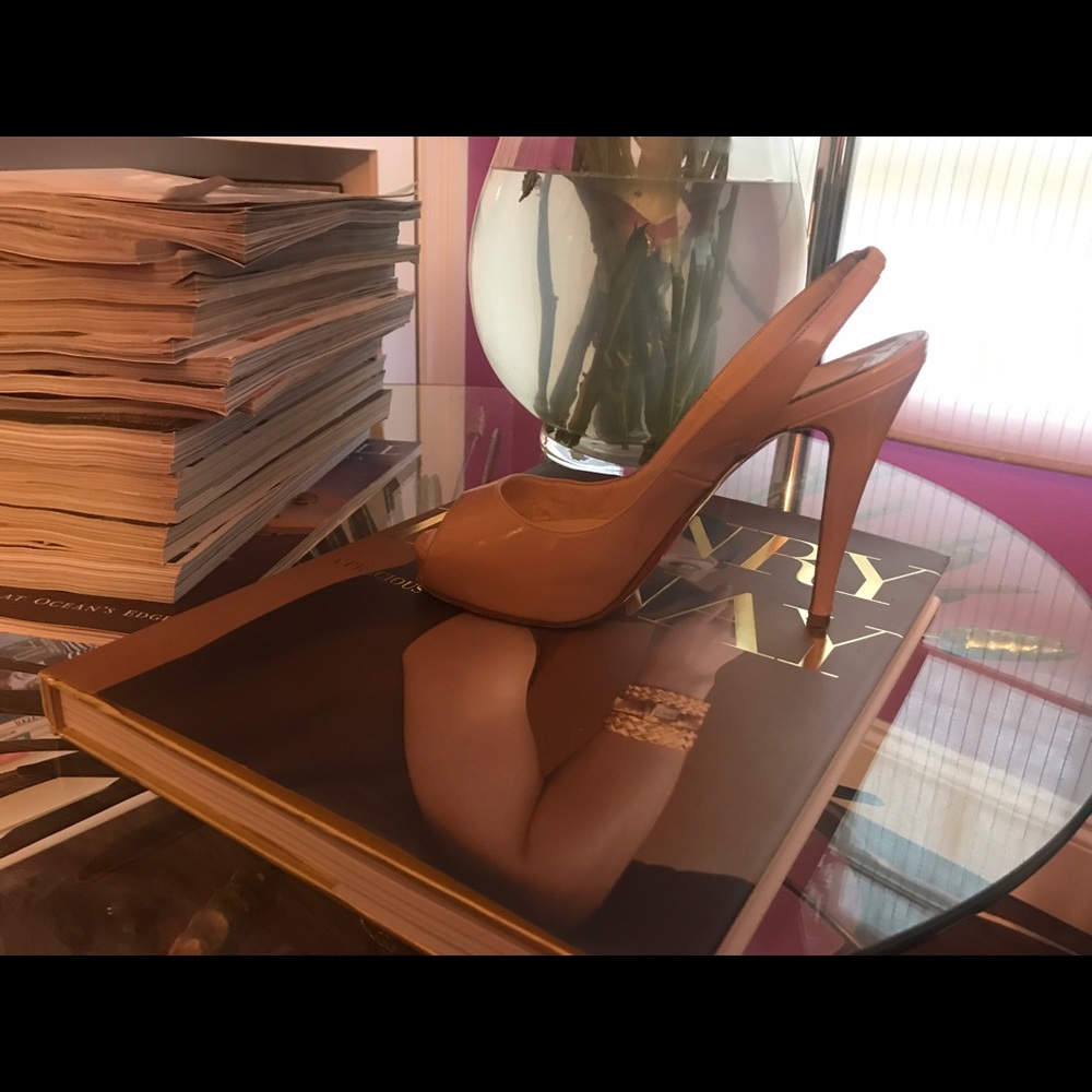 Louboutin's Nude Slingback Platform Pumps