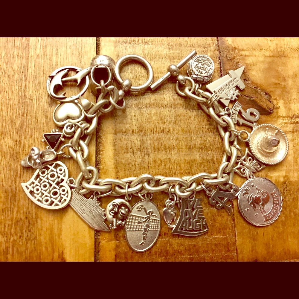 Sterling Silver charm Bracelet with 18 charms