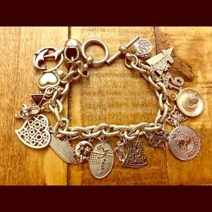 Sterling Silver charm Bracelet with 18 charms