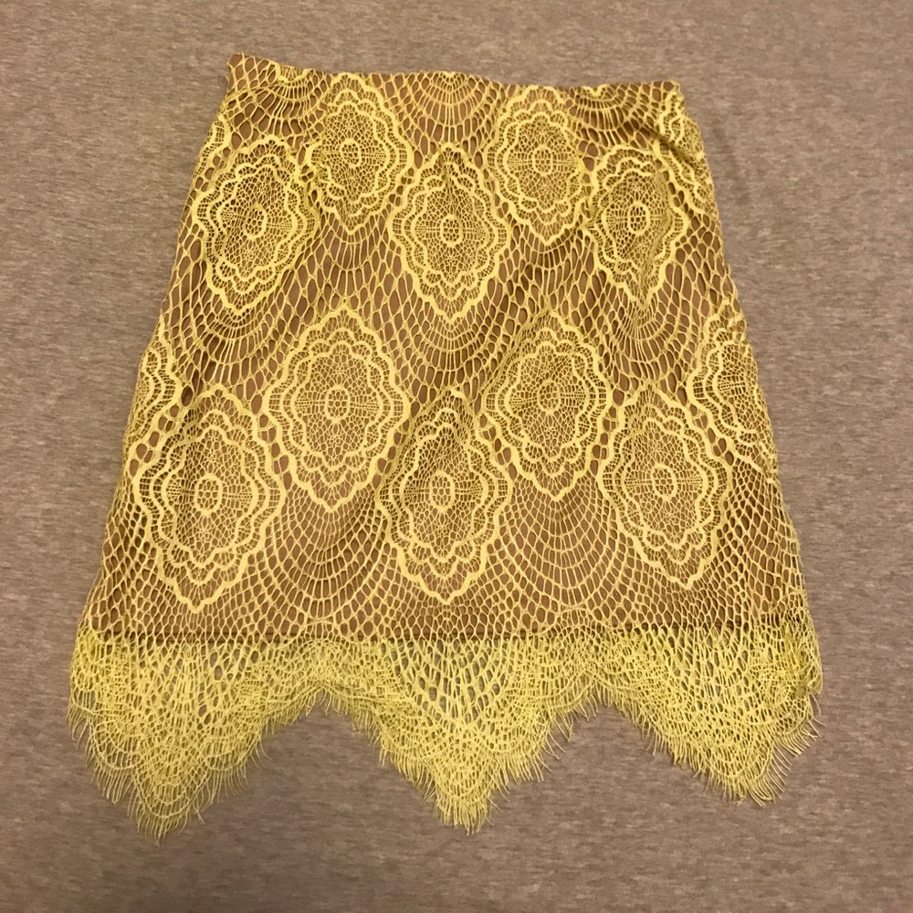 Yellow lace mini skirt