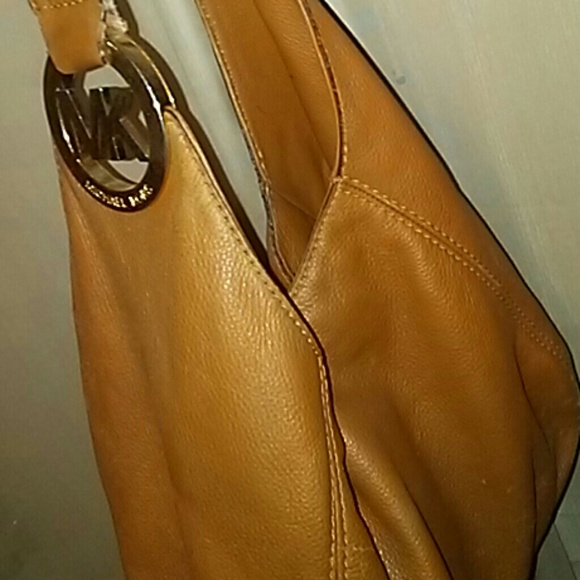 Michael Kors Handbags - Michael Kors light brown leather hobo bag
