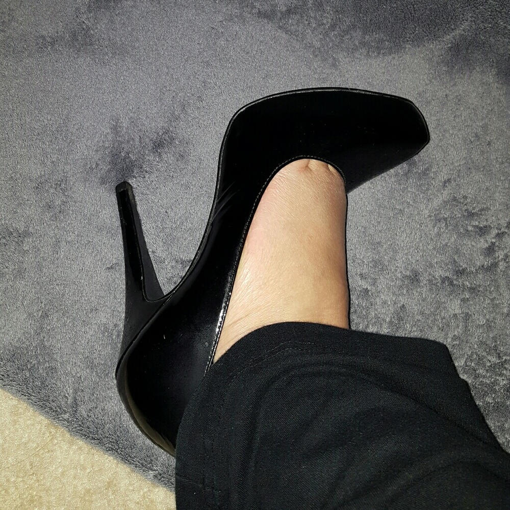 Black patent leather pumps