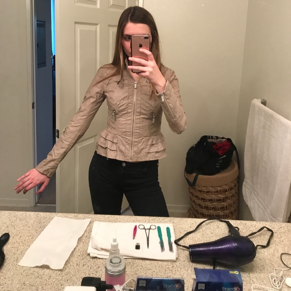 Peplum style faux leather jacket