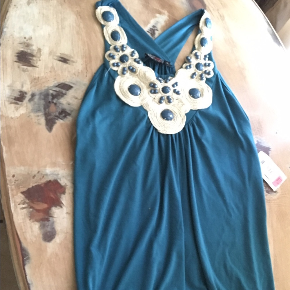 Teal, blue colored sleeveless top