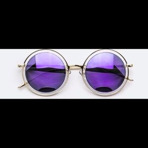 Retro Fashion Sunglasses with purple lenses.