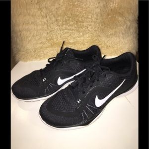 Black Nike training shoes