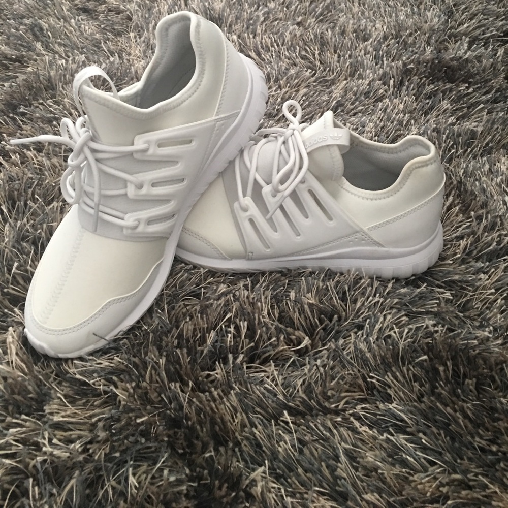 All white Adiddas Tubulars