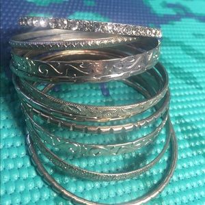 Buy 1 get 1 FREE! Assortment of sliver bangles