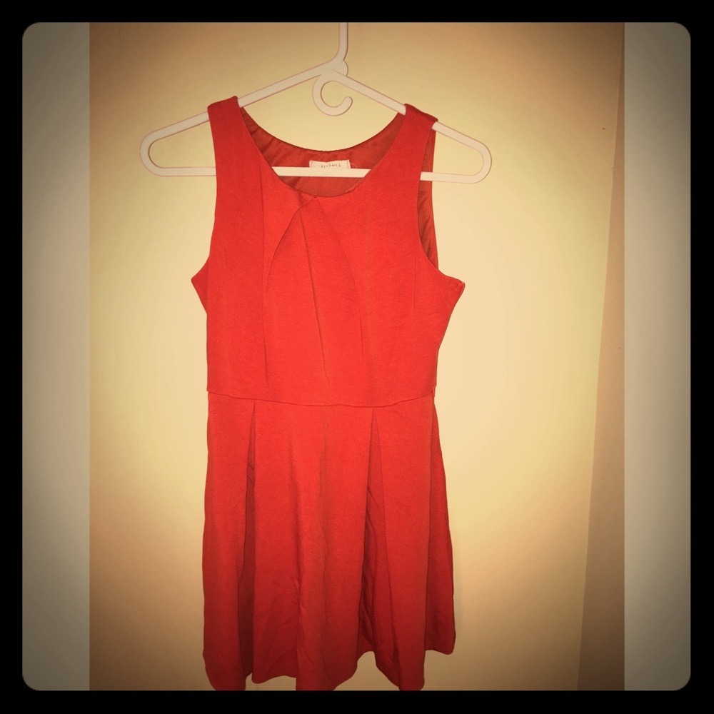 Orange pleated dress