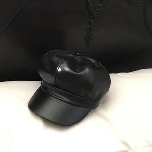 Faux leather cap