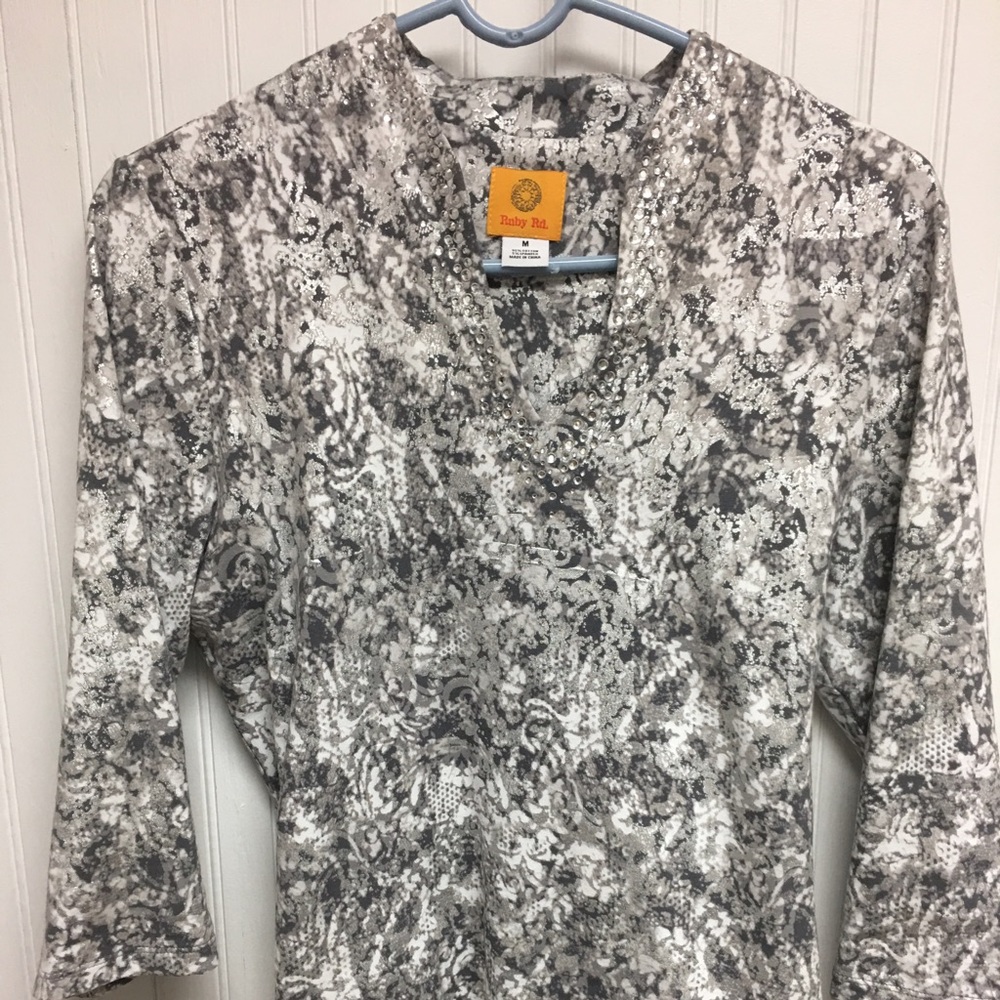 Medium soft top.  Ruby B. New purchased in Fla
