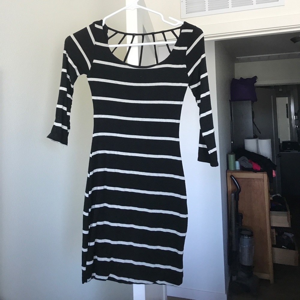 Black bodycon dress. 3/4 sleeves