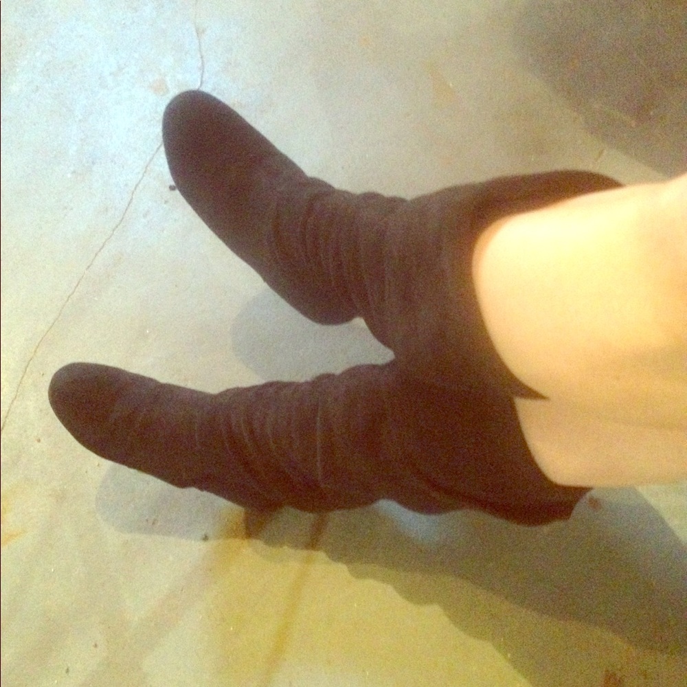 Pre-loved knee high boots.