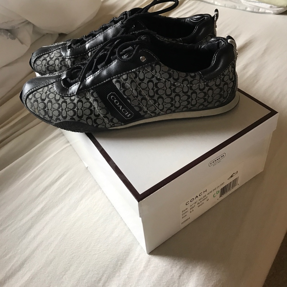 Black and white coach shoes
