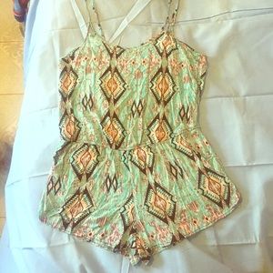 Turquoise and fluorescent pink romper