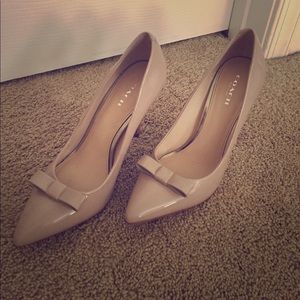 Like new classy nude color Coach heels
